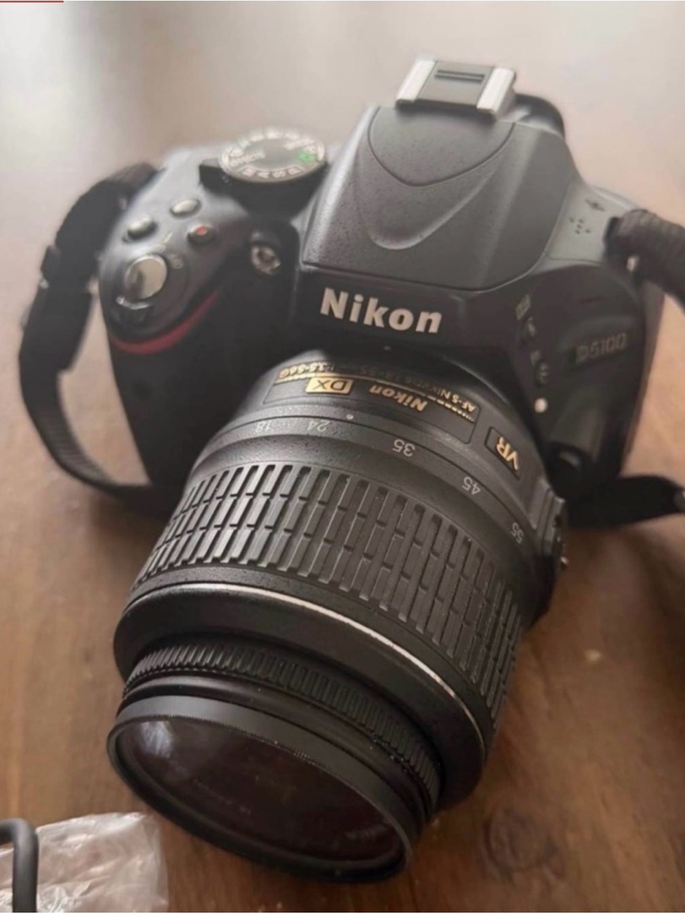 Nikon Black DSLR with 18-55mm VR Zoom Lens
